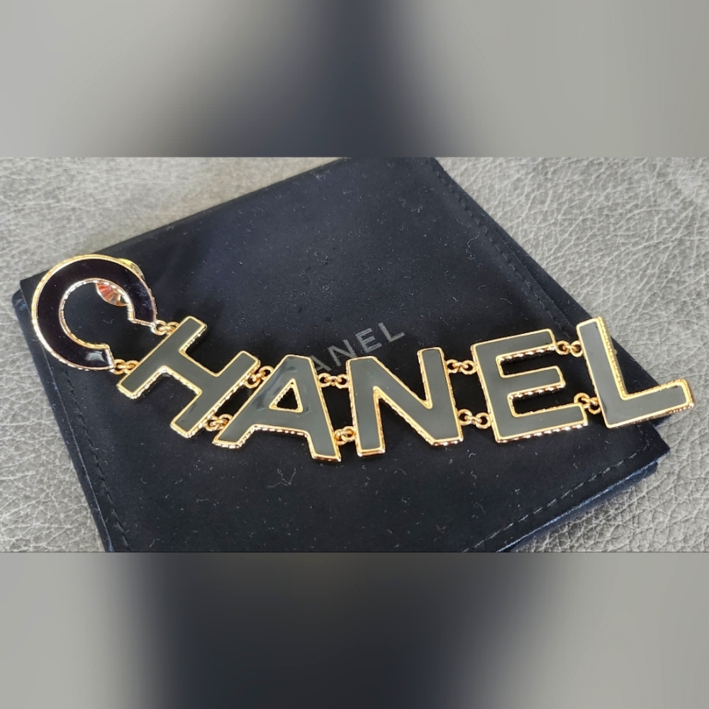 Chanel 22A Metal Enamel CHANEL Letters Brooch